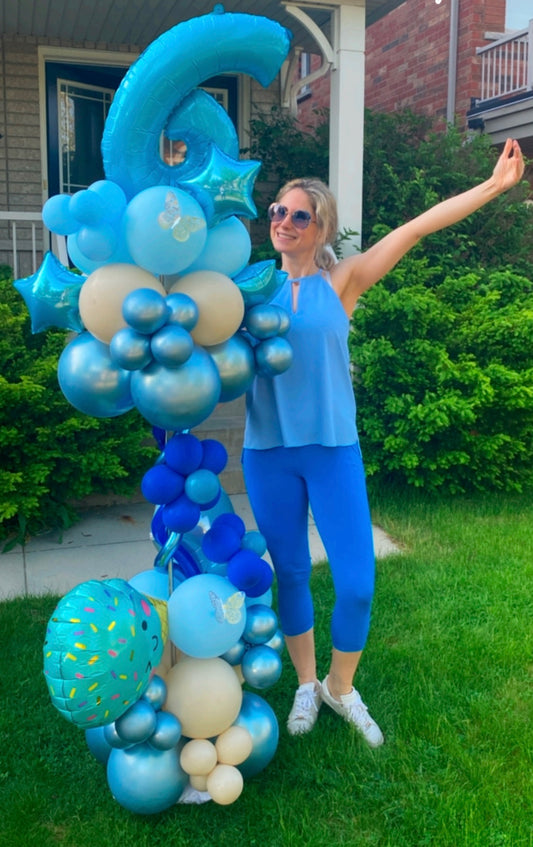 Vibrant Blue Birthday Balloon Display for a 6th Celebration