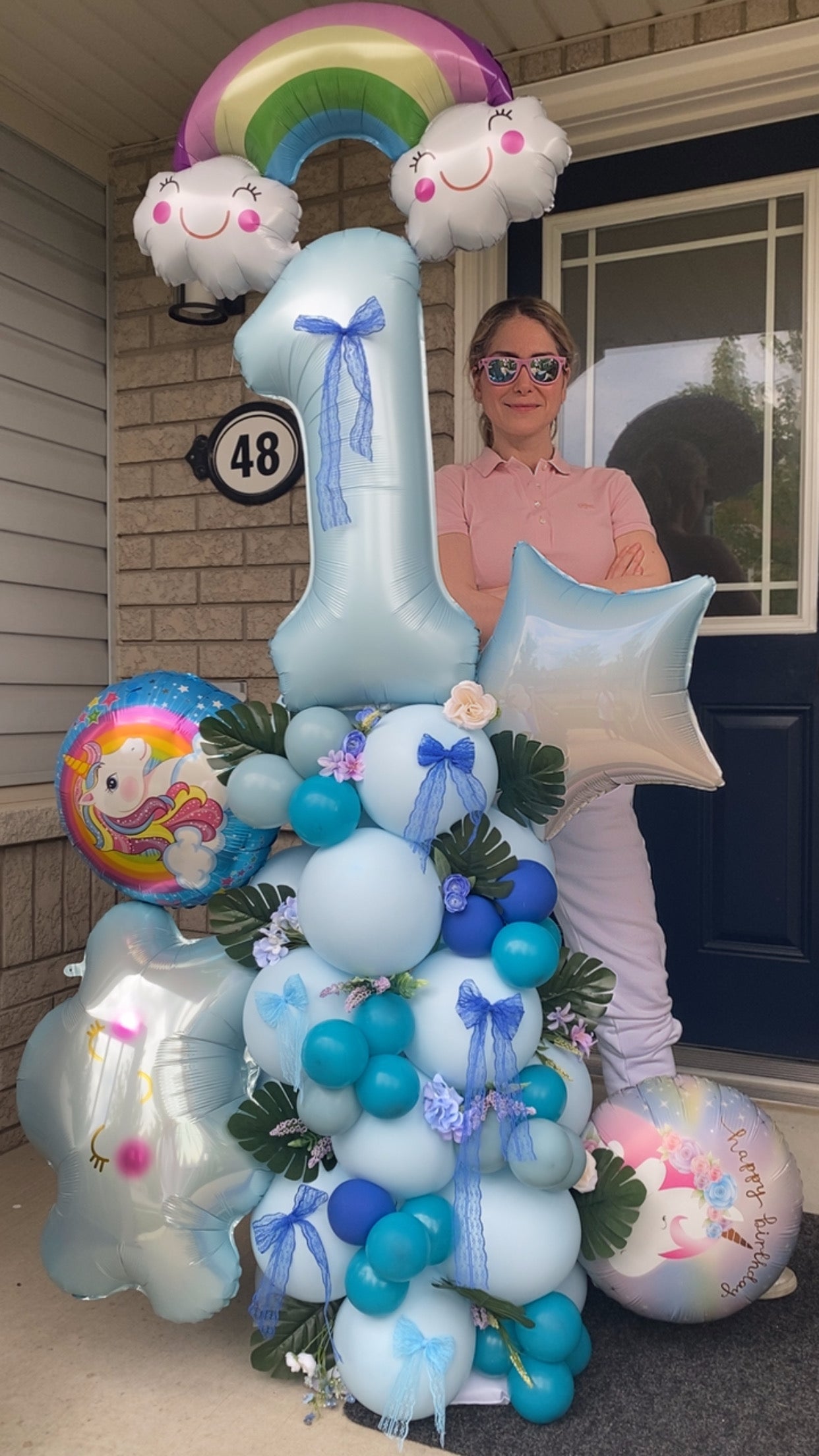 Rainbow and Unicorn-Themed 1st Birthday Balloon Display