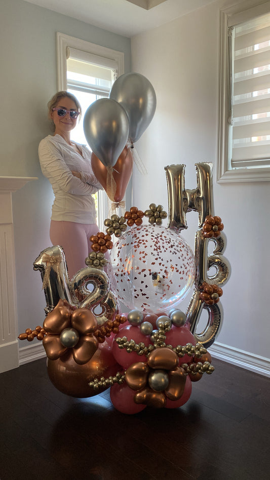 Luxurious Rose Gold and Silver Birthday Balloon Display