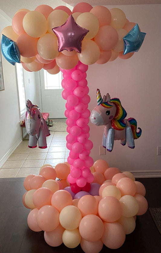 A cute balloon carousel for a birthday gift.